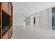 Spacious living room with hardwood floors and access to other rooms at 2251 Gulf Of Mexico Dr # 301, Longboat Key, FL 34228