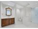 Bathroom with vanity, toilet and walk-in shower at 2251 Gulf Of Mexico Dr # 301, Longboat Key, FL 34228