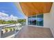 Spacious balcony with ocean views and wood ceiling at 2251 Gulf Of Mexico Dr # 301, Longboat Key, FL 34228