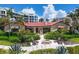 Relaxing patio with fire pit and seating area at 2251 Gulf Of Mexico Dr # 301, Longboat Key, FL 34228