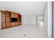 Open living area with neutral walls and hardwood floors at 2251 Gulf Of Mexico Dr # 301, Longboat Key, FL 34228
