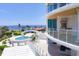 Private balcony overlooking the pool and ocean at 2251 Gulf Of Mexico Dr # 301, Longboat Key, FL 34228
