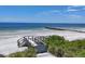 Beach access with boardwalk and lush vegetation at 2251 Gulf Of Mexico Dr # 301, Longboat Key, FL 34228