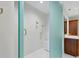 Walk-in shower with glass enclosure and dual shower heads at 2251 Gulf Of Mexico Dr # 301, Longboat Key, FL 34228
