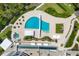 Overhead view of a resort-style pool and lush landscaping at 2251 Gulf Of Mexico Dr # 301, Longboat Key, FL 34228