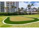 Community putting green with artificial turf at 2251 Gulf Of Mexico Dr # 301, Longboat Key, FL 34228