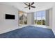 Bedroom with carpet, large windows, and ocean view at 2251 Gulf Of Mexico Dr # 301, Longboat Key, FL 34228