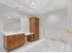 Luxury bathroom with soaking tub and dual sinks at 2251 Gulf Of Mexico Dr # 301, Longboat Key, FL 34228