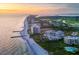 Aerial view of beachfront property and coastline at 2251 Gulf Of Mexico Dr # 301, Longboat Key, FL 34228