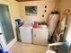 Functional laundry room with washer and dryer hookups at 2434 Fourwind St, Port Charlotte, FL 33948