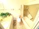 Clean bathroom with shower/tub combo, toilet and vanity at 2434 Fourwind St, Port Charlotte, FL 33948
