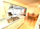 Kitchen features a double sink and views to dining area at 2434 Fourwind St, Port Charlotte, FL 33948