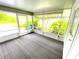 Screened porch with backyard view and access to the house at 2434 Fourwind St, Port Charlotte, FL 33948