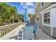 Relaxing deck features patio furniture and umbrella at 1914 24Th W Ave, Palmetto, FL 34221