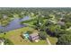 Aerial view of home on waterfront property with pool at 1914 24Th W Ave, Palmetto, FL 34221
