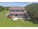 Aerial view of two story home with large yard at 1914 24Th W Ave, Palmetto, FL 34221