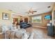 Spacious living area with comfortable seating and a view to the kitchen at 1914 24Th W Ave, Palmetto, FL 34221