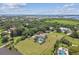 Aerial view of a house with a pool and large backyard at 1914 24Th W Ave, Palmetto, FL 34221