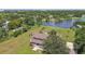 House with a lake view, a large backyard and a detached garage at 1914 24Th W Ave, Palmetto, FL 34221