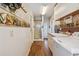 Laundry room with washer, dryer, shower, and access to backyard at 1914 24Th W Ave, Palmetto, FL 34221