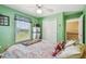 Bright bedroom with double closet and window at 1914 24Th W Ave, Palmetto, FL 34221