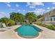 Relaxing pool and spa surrounded by tropical landscaping at 1914 24Th W Ave, Palmetto, FL 34221