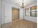 Spacious dining room with access to an office and tile floors at 1048 Bradberry Dr, Nokomis, FL 34275