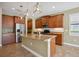 Kitchen features an island and stainless steel appliances at 1048 Bradberry Dr, Nokomis, FL 34275