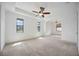 Large main bedroom with sitting area and carpet flooring at 1048 Bradberry Dr, Nokomis, FL 34275