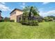 Beautiful home exterior with manicured landscaping at 1048 Bradberry Dr, Nokomis, FL 34275