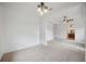 Main bedroom sitting area with carpet flooring and chandelier at 1048 Bradberry Dr, Nokomis, FL 34275