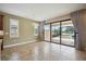 Bright dining room with sliding glass doors leading to a pool and patio area at 1048 Bradberry Dr, Nokomis, FL 34275