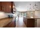 Kitchen with granite countertops, stainless steel appliances, and views to the backyard at 1048 Bradberry Dr, Nokomis, FL 34275