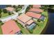 Aerial view of a house with pool, near a lake at 1048 Bradberry Dr, Nokomis, FL 34275