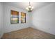 Bright dining room with tile floors and a chandelier at 1048 Bradberry Dr, Nokomis, FL 34275