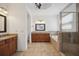 Elegant bathroom with double vanity, soaking tub, and shower at 1048 Bradberry Dr, Nokomis, FL 34275