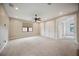 Bright and airy main bedroom with plush carpeting and ample closet space at 1048 Bradberry Dr, Nokomis, FL 34275