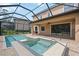 Enjoy this large pool and spa with screened enclosure and covered patio at 1048 Bradberry Dr, Nokomis, FL 34275