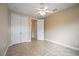 Bedroom with double doors leading to an ensuite bathroom at 1048 Bradberry Dr, Nokomis, FL 34275