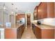 Spacious kitchen with granite countertops, stainless steel appliances, and ample cabinetry at 1048 Bradberry Dr, Nokomis, FL 34275
