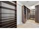 Spacious walk-in closet, offering ample storage with shelving and drawers at 1048 Bradberry Dr, Nokomis, FL 34275