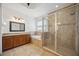 Spa-like bathroom with large shower and soaking tub at 1048 Bradberry Dr, Nokomis, FL 34275