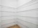 Large pantry with wire shelving providing ample storage space at 1048 Bradberry Dr, Nokomis, FL 34275