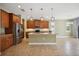 Kitchen boasts stainless steel appliances and an island at 1048 Bradberry Dr, Nokomis, FL 34275