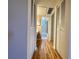 Hallway with light wood flooring and access to bedrooms and bathroom at 4480 Ironwood Cir # 305A, Bradenton, FL 34209