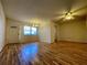 Bright dining room with laminate wood floors and a chandelier at 4480 Ironwood Cir # 305A, Bradenton, FL 34209