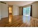 Bright bedroom with wood-look floors and access to bathroom at 4480 Ironwood Cir # 305A, Bradenton, FL 34209