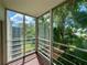 Private balcony offering treetop and building views at 4480 Ironwood Cir # 305A, Bradenton, FL 34209
