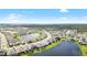 Aerial view of a large community with lakefront properties at 12665 Promenade Estates Blvd, Sarasota, FL 34238