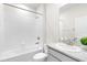 Clean bathroom with a shower/tub combo and gray vanity at 12665 Promenade Estates Blvd, Sarasota, FL 34238